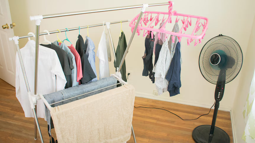 Damp clothes hanging in storage